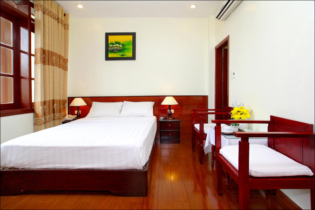 Nhi Trung Hotel هوي ان الغرفة الصورة